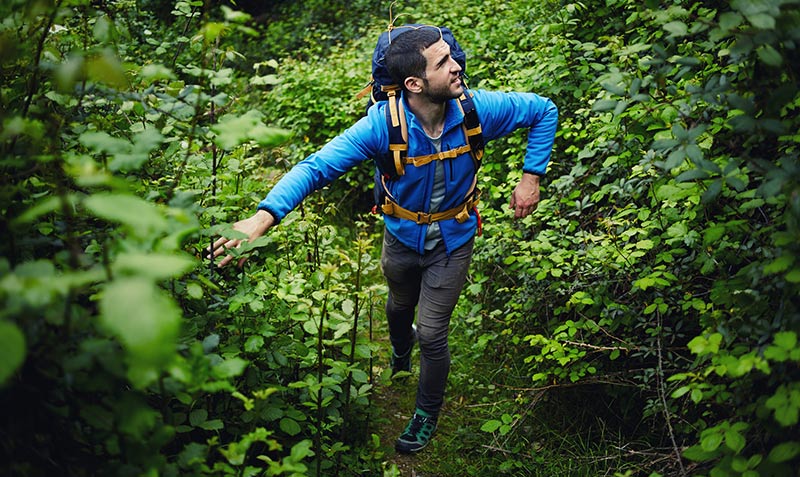 happy guy in forest