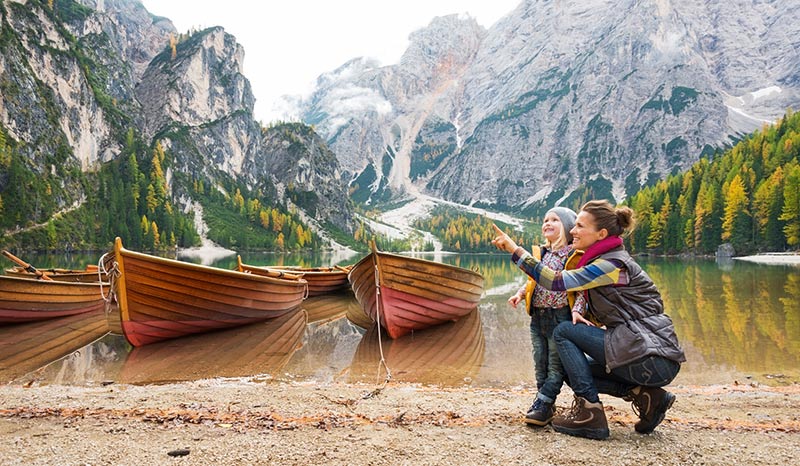 mother daughter on shore