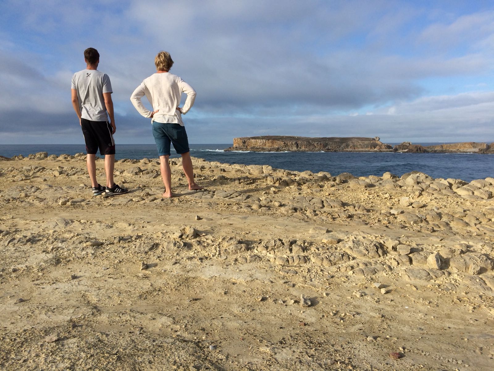 Friends of the author checking waves in Peniche