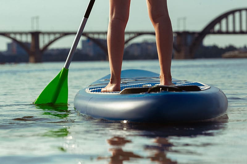 closeup sup and sup paddle