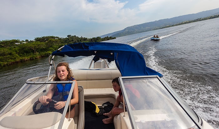 girl driving boat