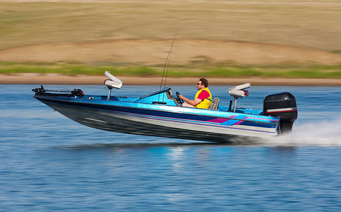 guy in speed boat