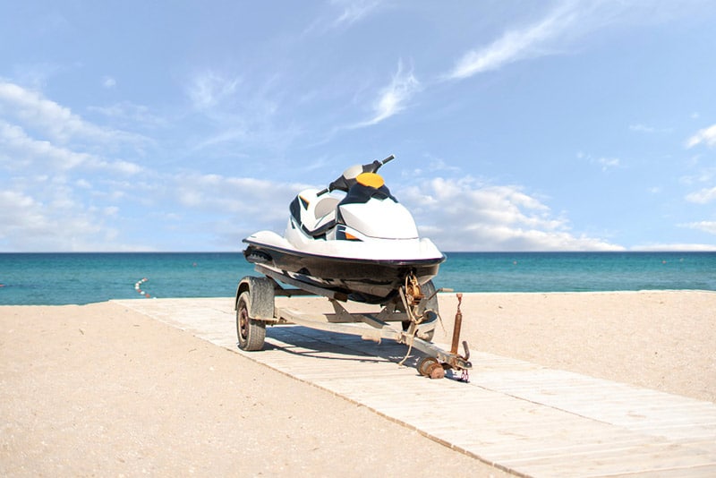 jet ski on trailer on beach