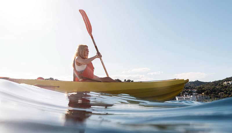 pregnant woman kayaking