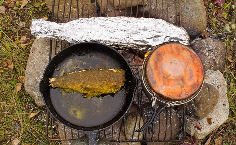 camp fire cooking with foil