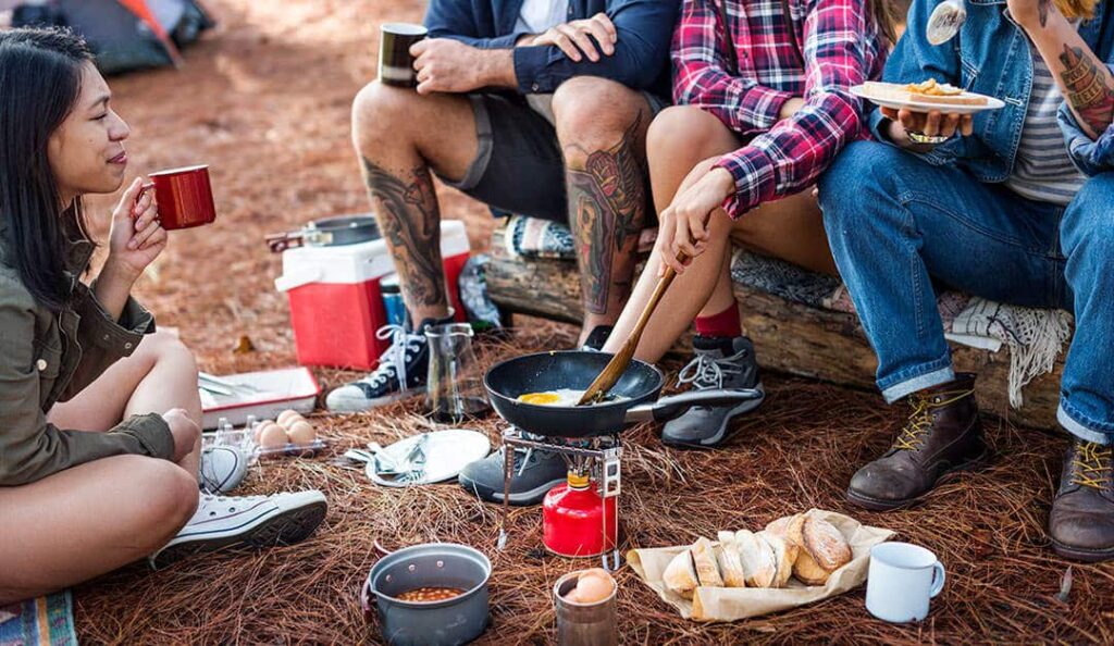 people making camp food