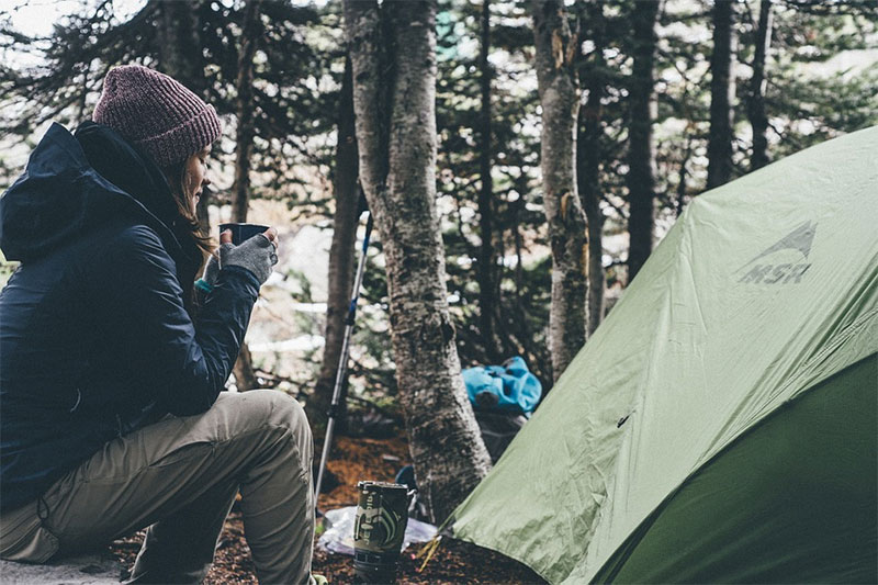 woman at camp site