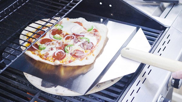 cooking pizza on gas grill