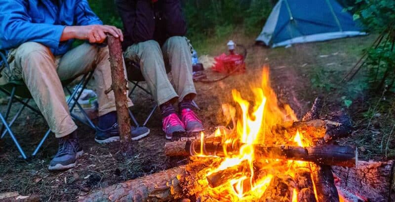 couple by campfire