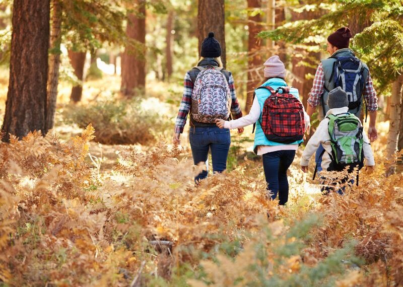 family hiking in autumn