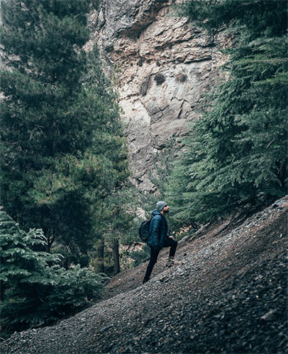 guy hiking steep trail