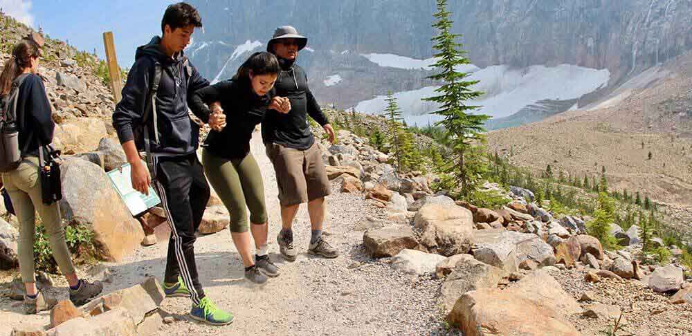 hiker getting helped