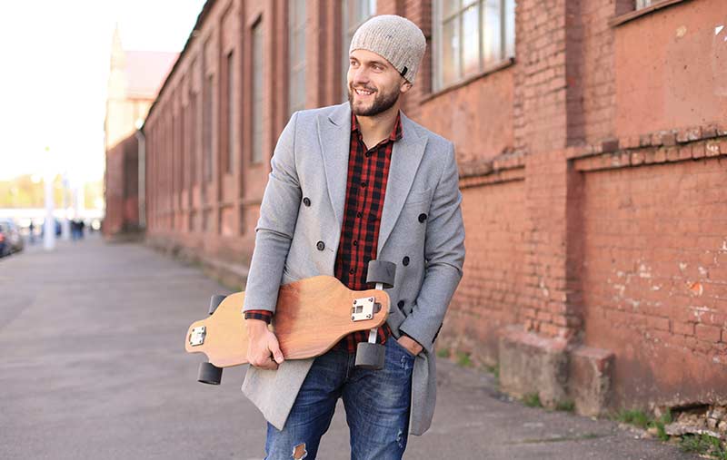 guy holding longboard