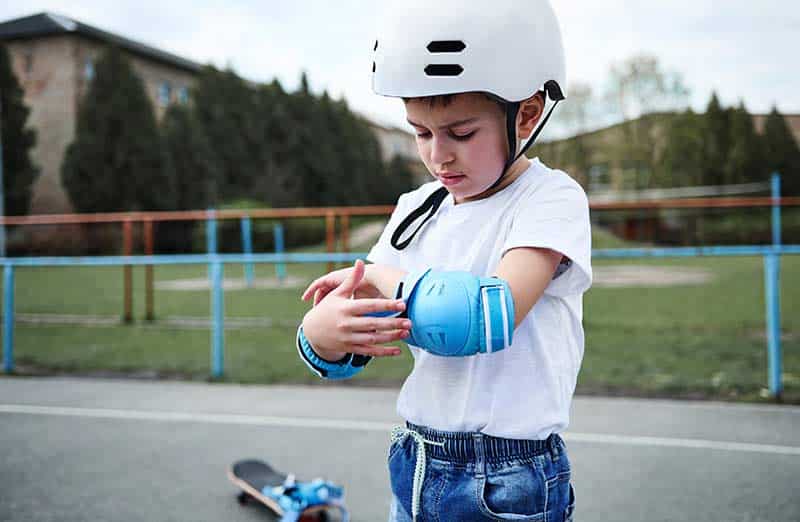 kid wearing skateboard gear